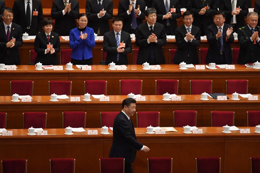 O presidente chinês, Xi Jinping, sendo aplaudido no  Congresso Nacional do Povo (CNP), em 2018