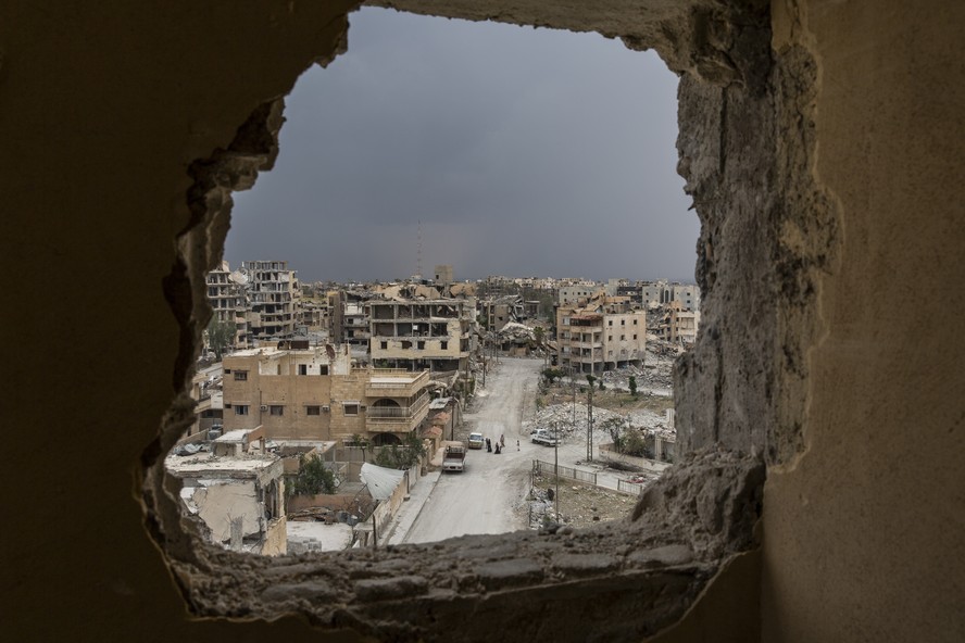 Edifícios em ruínas após ataque do grupo Estado Islâmico em Raqa, na Síria