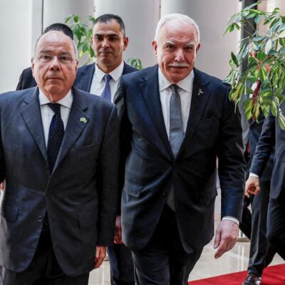Palestinian Foreign Minister Riyad al-Maliki walks with Brazilian Foreign Minister Mauro Vieira, in Ramallah in the Israeli-occupied West Bank, March 17, 2024. REUTERS/Mohammed Torokman