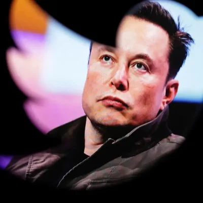 Illustration shows Elon Musk's photo and Twitter logo
