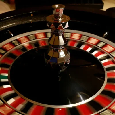 FILE PHOTO: The spinning wheel on a Roulette table is seen at the Dragonara Casino in St Julian's
