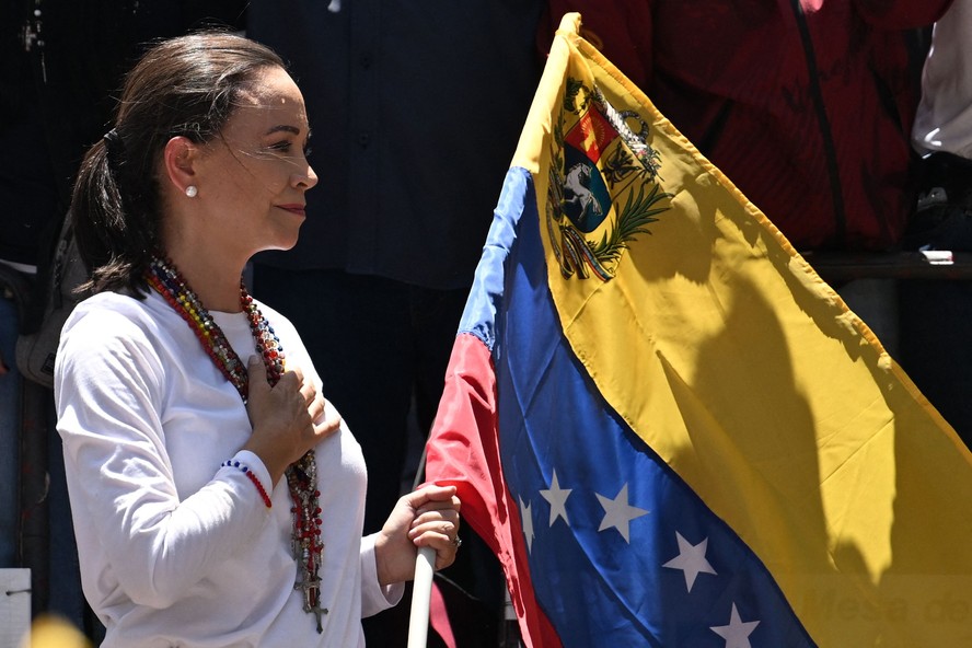 María Corina Machado, líder da oposição venezuelana, durante ato em Caracas em agosto