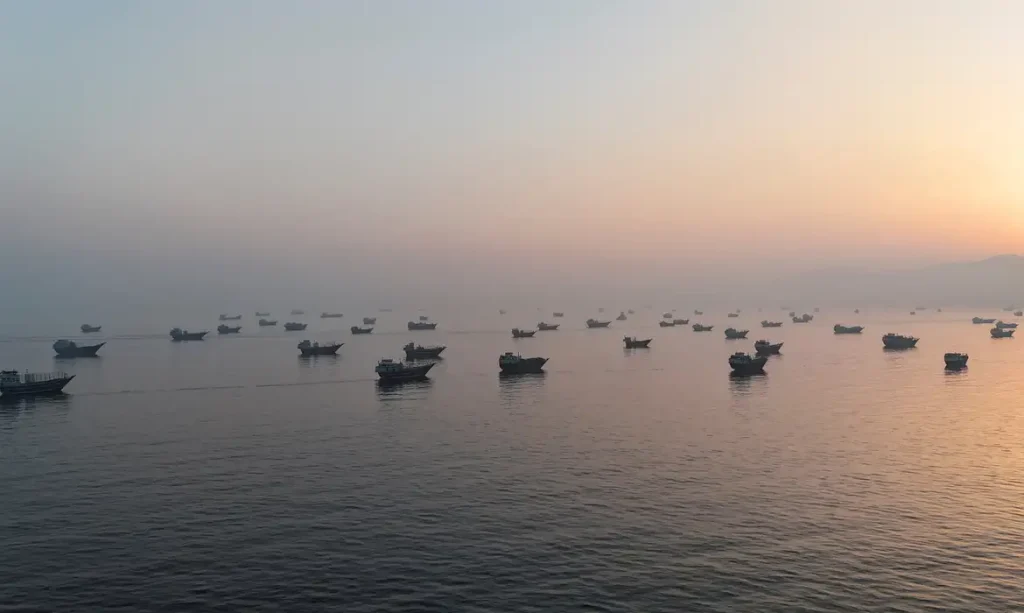 FILE PHOTO: A drone view shows vessels in the Strait of Hormuz, as seen from Musandam, Oman, June 15, 2026. REUTERS/Stringer/File Photo
