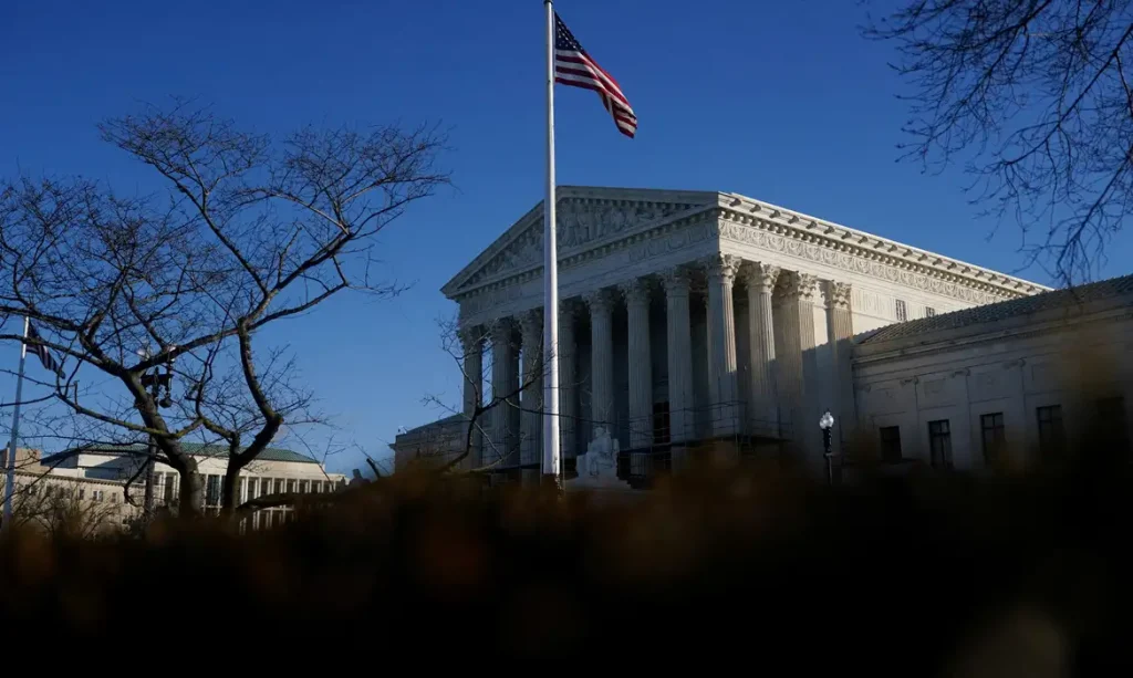 FILE PHOTO: A general view of U.S. Supreme Court as justices could issue at least one ruling in several major cases pending including a decision on the legality of President Donald Trump's sweeping global tariffs, in Washington, D.C., U.S., January 20, 2026.  REUTERS/Nathan Howard     REFILE - CORRECTING