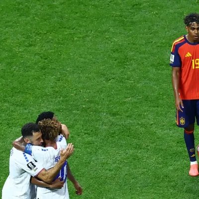 Soccer Football - FIFA World Cup 2026 - Group H - Spain v Cape Verde - Atlanta Stadium, Atlanta, Georgia, U.S. - June 15, 2026 Cape Verde's Pico Lopes, Ryan Mendes and Joao Paulo celebrate as Spain's Lamine Yamal looks dejected after the match REUTERS/Bernadett Szabo
