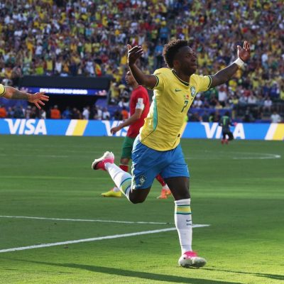 Soccer Football - FIFA World Cup 2026 - Group C - Brazil v Morocco - New York/New Jersey Stadium, East Rutherford, New Jersey, U.S. - June 13, 2026 Brazil's Vinicius Junior celebrates scoring their first goal with Bruno Guimaraes IMAGN IMAGES via Reuters/Vincent Carchietta
