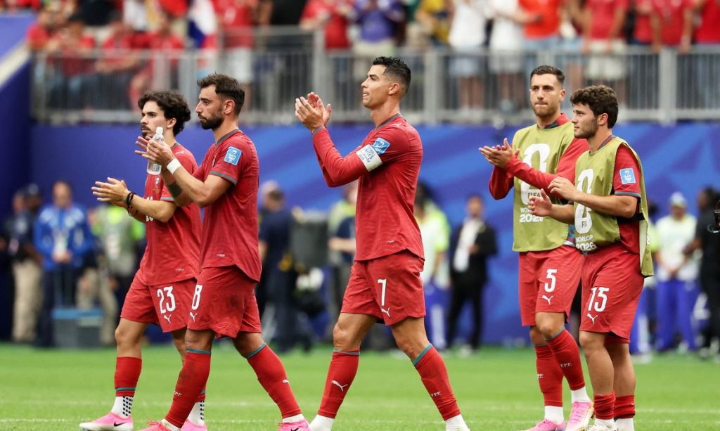 Soccer Football - FIFA World Cup 2026 - Group K - Portugal v Uzbekistan - Houston Stadium, Houston, Texas, U.S. - June 23, 2026 Portugal's Cristiano Ronaldo, Bruno Fernandes, Vitinha, Joao Neves and Diogo Dalot celebrate after the match IMAGN IMAGES via Reuters/Troy Taormina