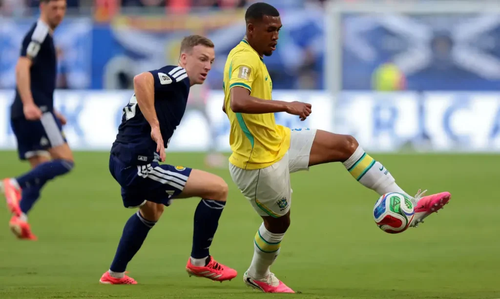 Soccer Football - FIFA World Cup 2026 - Group C - Scotland v Brazil - Miami Stadium, Miami Gardens, Florida, U.S. - June 24, 2026 Brazil's Rayan in action with Scotland's Lewis Ferguson IMAGN IMAGES via Reuters/Sam Navarro