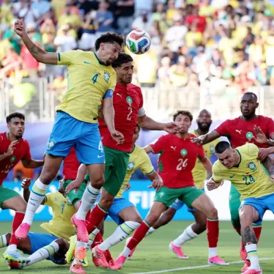 Soccer Football - FIFA World Cup 2026 - Group C - Brazil v Morocco - New York/New Jersey Stadium, East Rutherford, New Jersey, U.S. - June 13, 2026 Brazil's Marquinhos in action with Morocco's Achraf Hakimi REUTERS/John Sibley