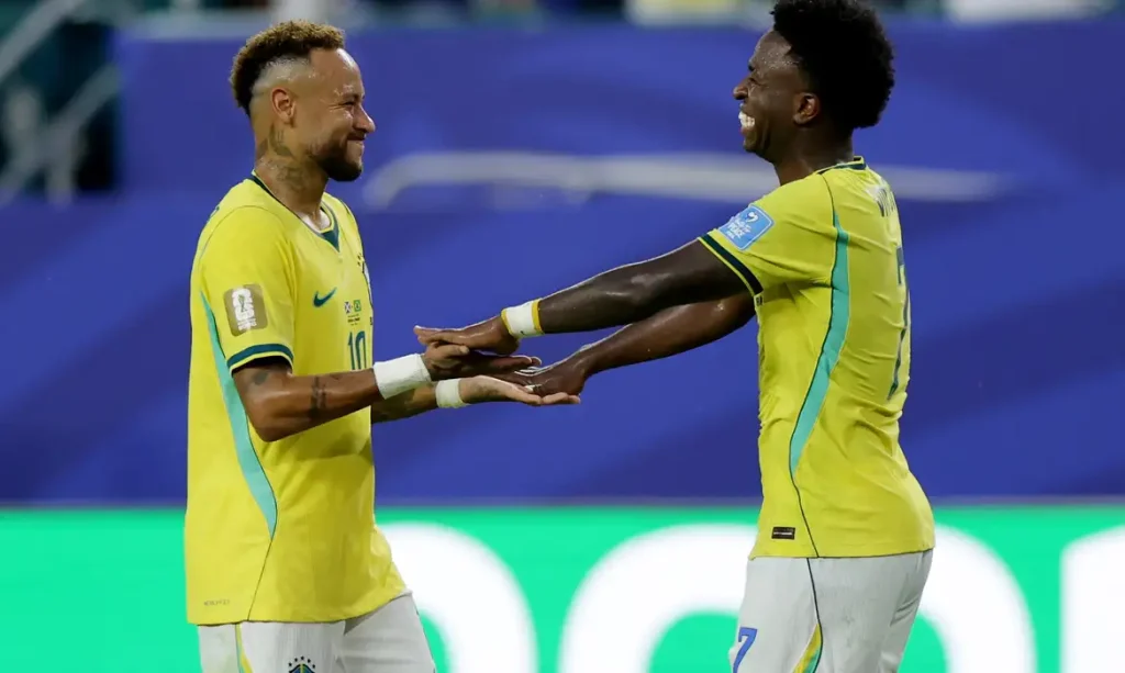 Soccer Football - FIFA World Cup 2026 - Group C - Scotland v Brazil - Miami Stadium, Miami Gardens, Florida, U.S. - June 24, 2026 Brazil's Neymar Jr. and Vinicius Junior celebrate after the match REUTERS/Amanda Perobelli