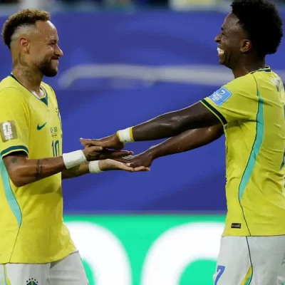Soccer Football - FIFA World Cup 2026 - Group C - Scotland v Brazil - Miami Stadium, Miami Gardens, Florida, U.S. - June 24, 2026 Brazil's Neymar Jr. and Vinicius Junior celebrate after the match REUTERS/Amanda Perobelli