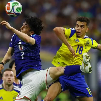 Soccer Football - FIFA World Cup 2026 - Group F - Japan v Sweden - Dallas Stadium, Arlington, Texas, U.S. - June 25, 2026 Japan's Ao Tanaka in action with Sweden's Yasin Ayari REUTERS/Issei Kato