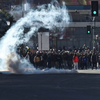 Demonstrators from mining unions face police forces as they protest against President Rodrigo Paz's government amid an ongoing economic and fuel crisis, in La Paz, Bolivia, May 14, 2026. REUTERS/Claudia Morales