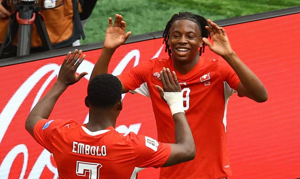 Soccer Football - FIFA World Cup 2026 - Group B - Switzerland v Canada - BC Place, Vancouver, Canada - June 24, 2026 Switzerland's Johan Manzambi celebrates scoring their second goal with Breel Embolo REUTERS/Albert Gea