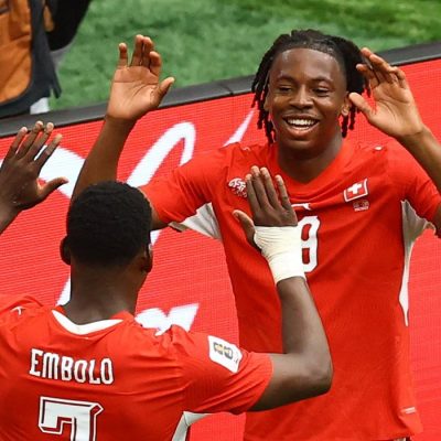 Soccer Football - FIFA World Cup 2026 - Group B - Switzerland v Canada - BC Place, Vancouver, Canada - June 24, 2026 Switzerland's Johan Manzambi celebrates scoring their second goal with Breel Embolo REUTERS/Albert Gea