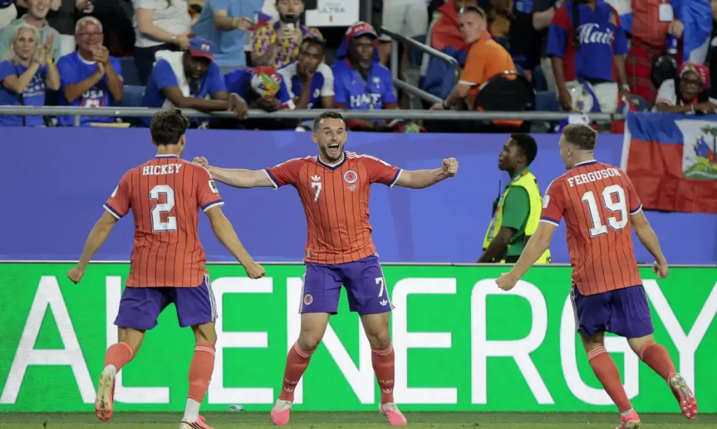 Soccer Football - FIFA World Cup 2026 - Group C - Haiti v Scotland - Boston Stadium, Foxborough, Massachusetts, U.S. - June 13, 2026 Scotland's John McGinn celebrates scoring their first goal with Aaron Hickey and Lewis Ferguson REUTERS/Brian Snyder