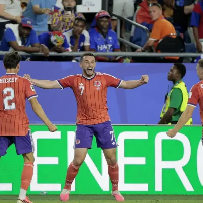 Soccer Football - FIFA World Cup 2026 - Group C - Haiti v Scotland - Boston Stadium, Foxborough, Massachusetts, U.S. - June 13, 2026 Scotland's John McGinn celebrates scoring their first goal with Aaron Hickey and Lewis Ferguson REUTERS/Brian Snyder
