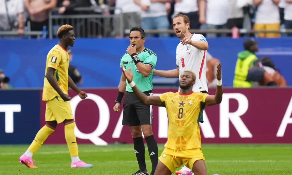 Soccer Football - FIFA World Cup 2026 - Group L - England v Ghana - Boston Stadium, Foxborough, Massachusetts, U.S. - June 23, 2026 Ghana's Kwasi Sibo celebrates as England's Harry Kane talks to referee Said Martinez after the match IMAGN IMAGES via Reuters/David Butler Ii