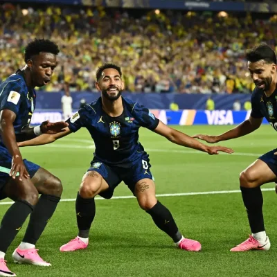Soccer Football - FIFA World Cup 2026 - Group C - Brazil v Haiti - Philadelphia Stadium, Philadelphia, Pennsylvania, U.S. - June 19, 2026 Brazil's Matheus Cunha celebrates scoring their second goal with Vinicius Junior and Lucas Paqueta REUTERS/Dylan Martinez