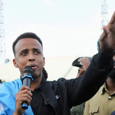 FILE PHOTO: Somali referee Omar Abdulkadir Artan, who was expected to officiate at matches during the 2026 FIFA World Cup but was denied entry to U.S., addresses fans at the Mogadishu stadium, in Mogadishu, Somalia, June 10, 2026 REUTERS/Feisal Omar/File Photo