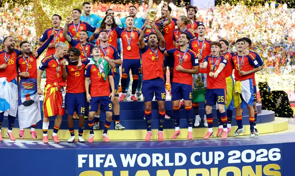 Soccer Football - FIFA World Cup 2026 - Final - Spain v Argentina - New York/New Jersey Stadium, East Rutherford, New Jersey, U.S. - July 19, 2026 Spain's Rodri lifts the trophy with teammates after winning the World Cup REUTERS/Kai Pfaffenbach
