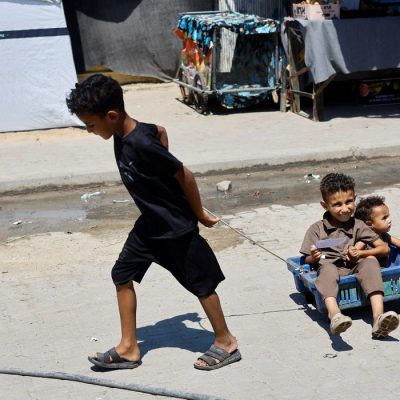 Palestinian children play on a street, in Nuseirat, central Gaza Strip, July 15, 2026. REUTERS/Mahmoud Issa