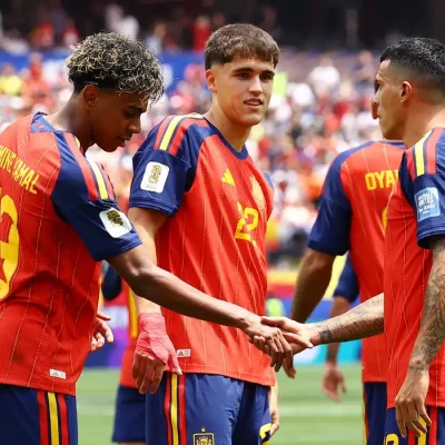 Soccer Football - FIFA World Cup 2026 - Round of 32 - Spain v Austria - Los Angeles Stadium, Inglewood, California, U.S. - July 2, 2026 Spain's Pedro Porro celebrates scoring their second goal with Lamine Yamal and Pau Cubarsi REUTERS/Lisi Niesner
