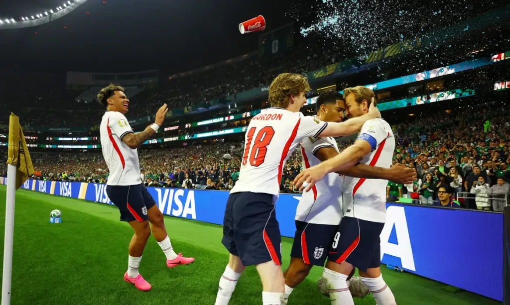 Soccer Football - FIFA World Cup 2026 - Round of 16 - Mexico v England - Estadio Azteca, Mexico City, Mexico - July 5, 2026 England's Harry Kane celebrates scoring their third goal with teammates REUTERS/Daniel Becerril     TPX IMAGES OF THE DAY