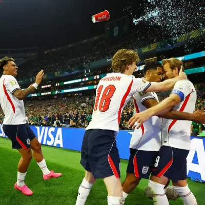 Soccer Football - FIFA World Cup 2026 - Round of 16 - Mexico v England - Estadio Azteca, Mexico City, Mexico - July 5, 2026 England's Harry Kane celebrates scoring their third goal with teammates REUTERS/Daniel Becerril     TPX IMAGES OF THE DAY