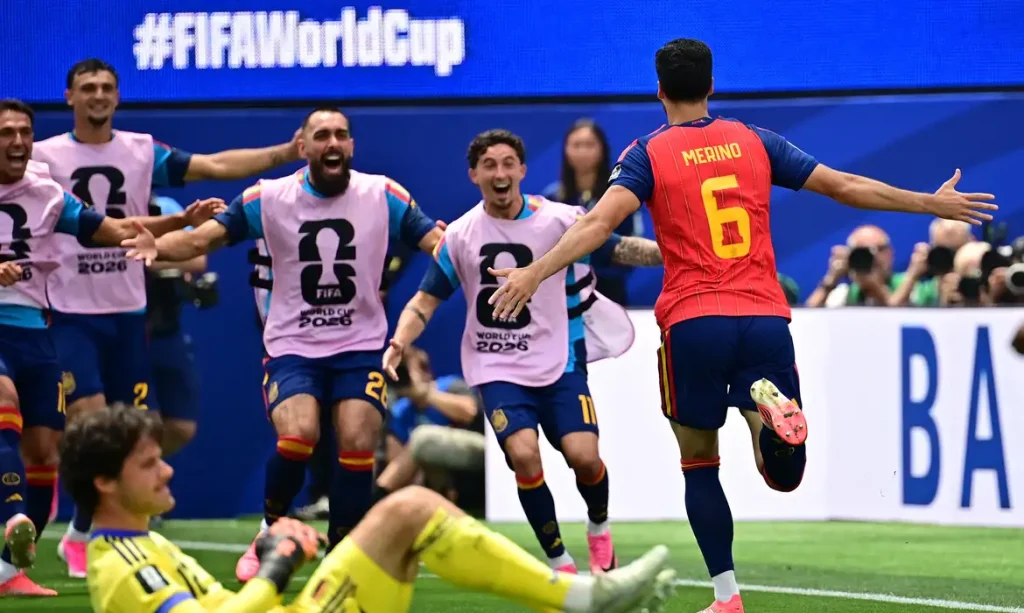 Soccer Football - FIFA World Cup 2026 - Quarter Final - Spain v Belgium - Los Angeles Stadium, Inglewood, California, U.S. - July 10, 2026 Spain's Mikel Merino celebrates scoring their second goal as Belgium's Senne Lammens looks dejected IMAGN IMAGES via Reuters/Gary Vasquez