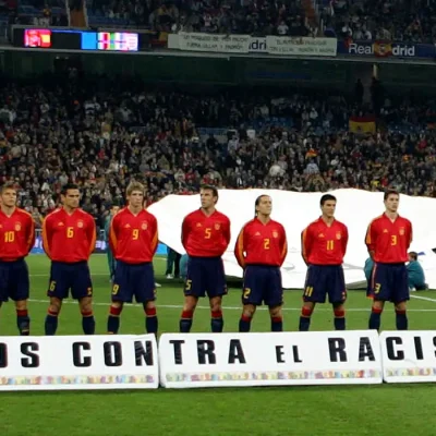 Spanish football players line up in front of anti-racism banner prior to their international friendly against England in Madrid. Spain's football team line-up in front of a banner which reads
