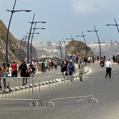 Migrants cross on foot into the North African enclave of Ceuta from Morocco by attemping to swim, according to Spain's Guardia Civil, near the border with Ceuta, in Fnideq, Morocco, July 30, 2026, in this still image obtained by REUTERS. THIS IMAGE HAS BEEN SUPPLIED BY A THIRD PARTY.   VERIFICATION: - Buildings, coastline and road layout matched satellite and archive imagery. - Coordinates: 35.85783579352456, -5.346942135788912. - Date verified by original file metadata.