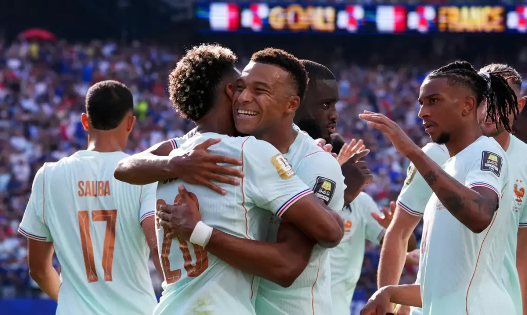Soccer Football - FIFA World Cup 2026 - Quarter Final - France v Morocco - Boston Stadium, Foxborough, Massachusetts, U.S. - July 9, 2026 France's Kylian Mbappe celebrates scoring their first goal with Desire Doue and Michael Olise IMAGN IMAGES via Reuters/David Butler Ii