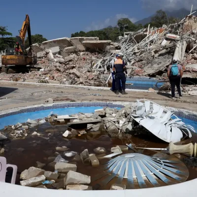 Rescuers work at the site of a collapsed building in the aftermath of the June 24 earthquakes in La Guaira, Venezuela, July 1, 2026. REUTERS/Ricardo Arduengo