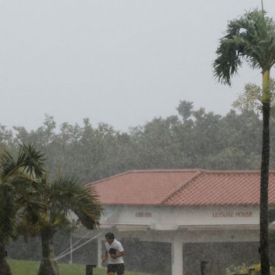 A man runs in the heavy rain as Typhoon Bavi approaches in Ishigaki, Japan, July 10, 2026.  REUTERS/Kim Kyung-Hoon      TPX IMAGES OF THE DAY