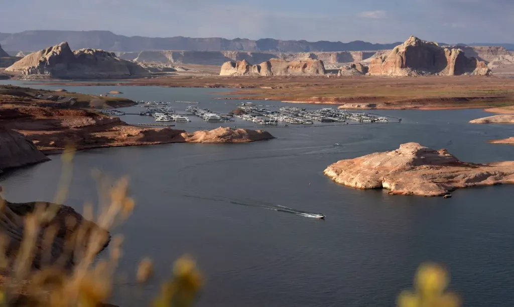 A boat departs from Wahweap Marina on Lake Powell, as the critical reservoir sits at its lowest ever recorded water level, in Glen Canyon National Recreation Area near Page, Arizona, U.S. August 30, 2026.  REUTERS/Rebecca Noble