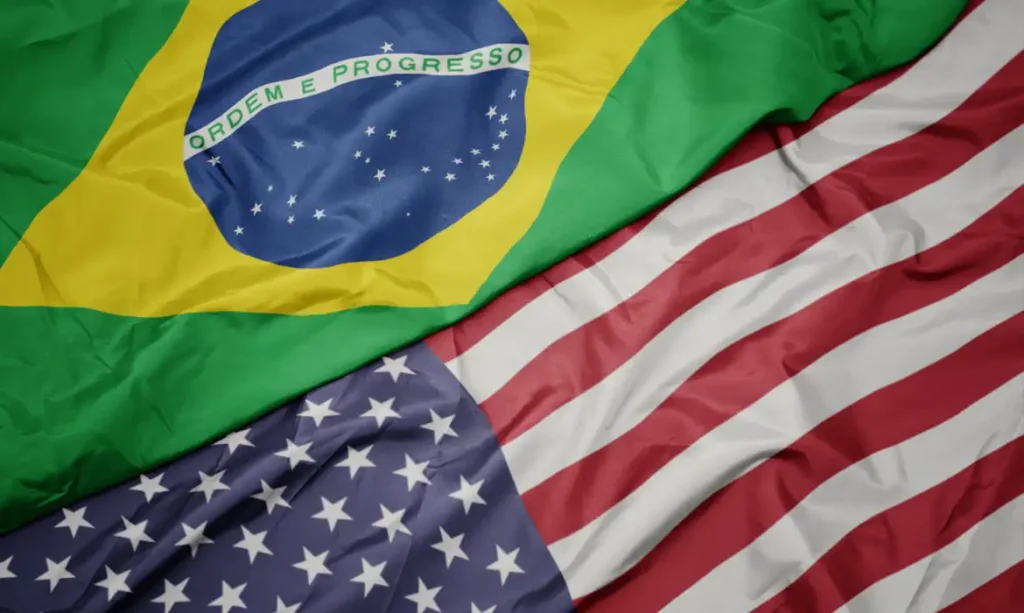 Bandeira do Brasil com a Bandeira dos Estados Unidos. Foto: luzitanija/ Adobe Stock
