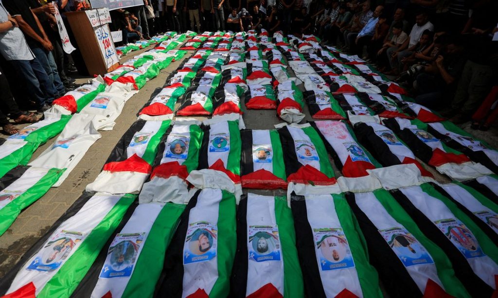 Mass funeral for members of the Irahem, Malaka, Qanbour, Balawi and Dahdouh families, who were killed in an Israeli strike in 2023 and whose remains were recovered from beneath the rubble, according to Gaza’s Civil Defense, in Gaza City, September 6, 2026. REUTERS/Dawoud Abu Alkas     TPX IMAGES OF THE DAY