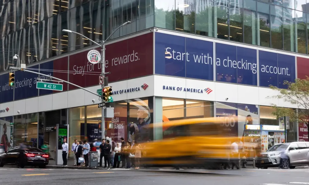 People walk by a Bank of America office in New York City, U.S., September 1, 2026. REUTERS/Jordan Tovin